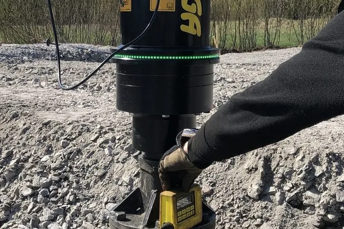 Digga drive head installing a helical pile, Porvoo