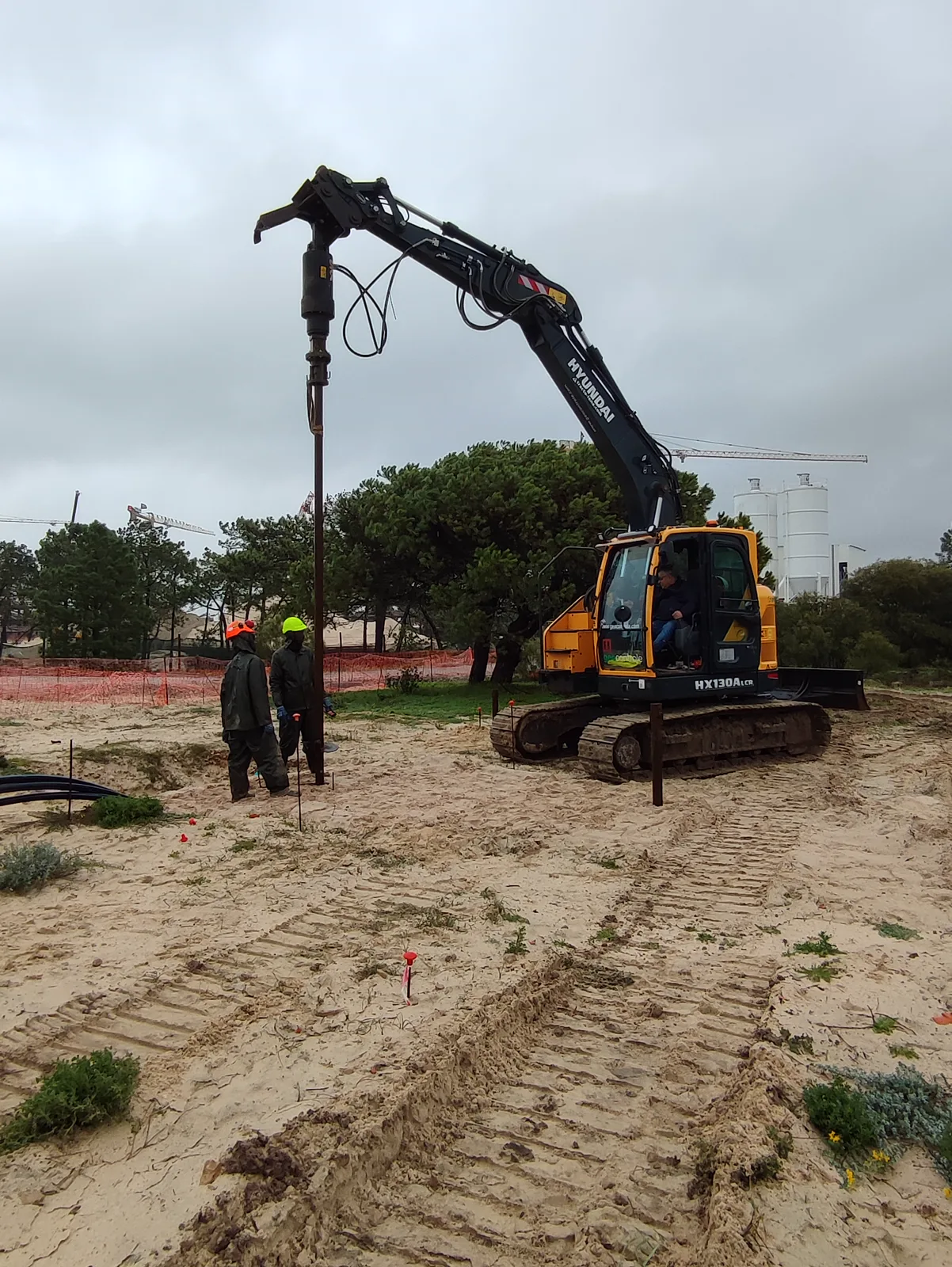 Helical pile installation for a building in Tróia